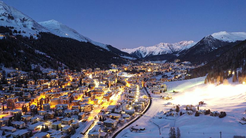Busy Davos ski resort at night in winter