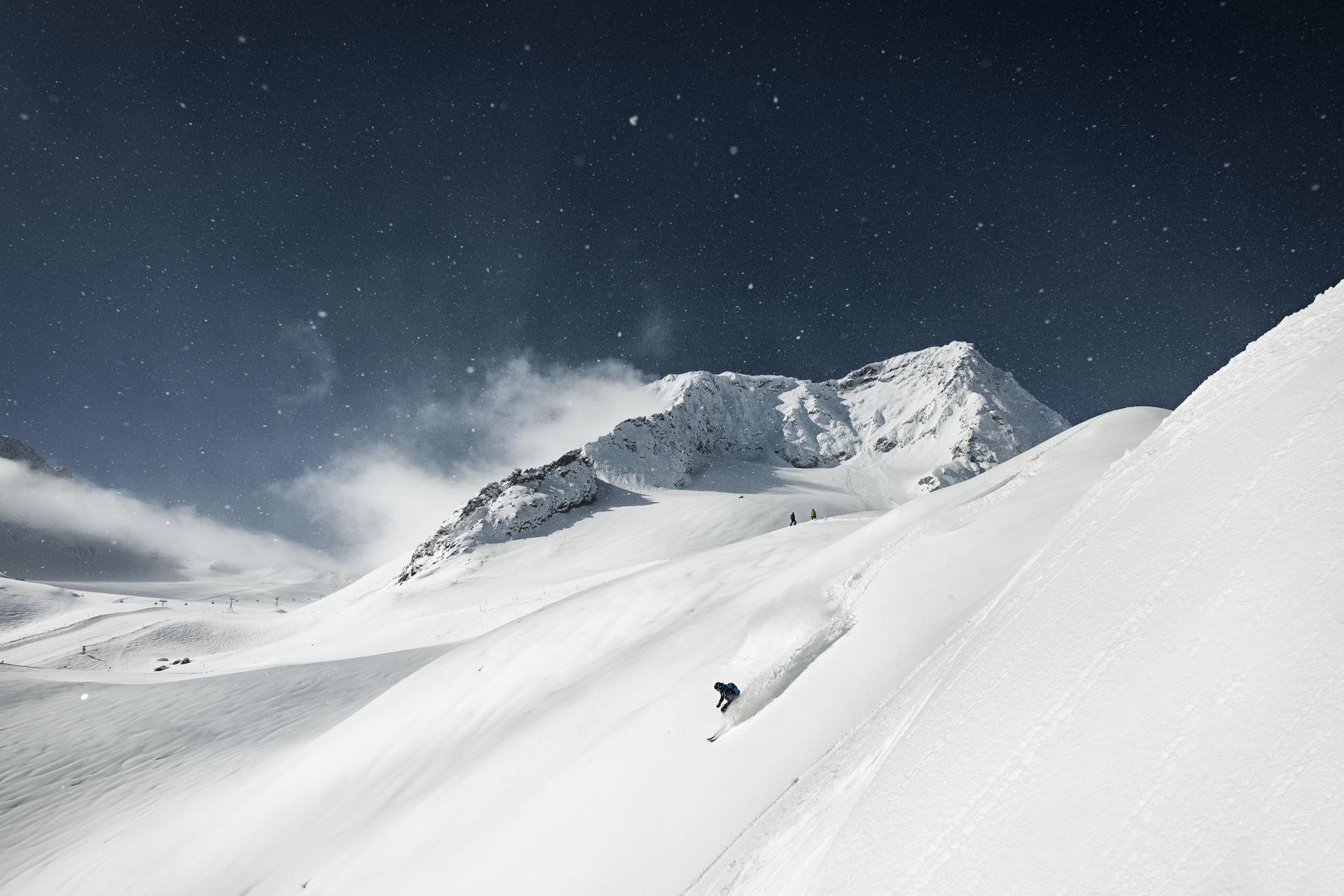 Skier on off piste powder at Stubai Glacier ski resort