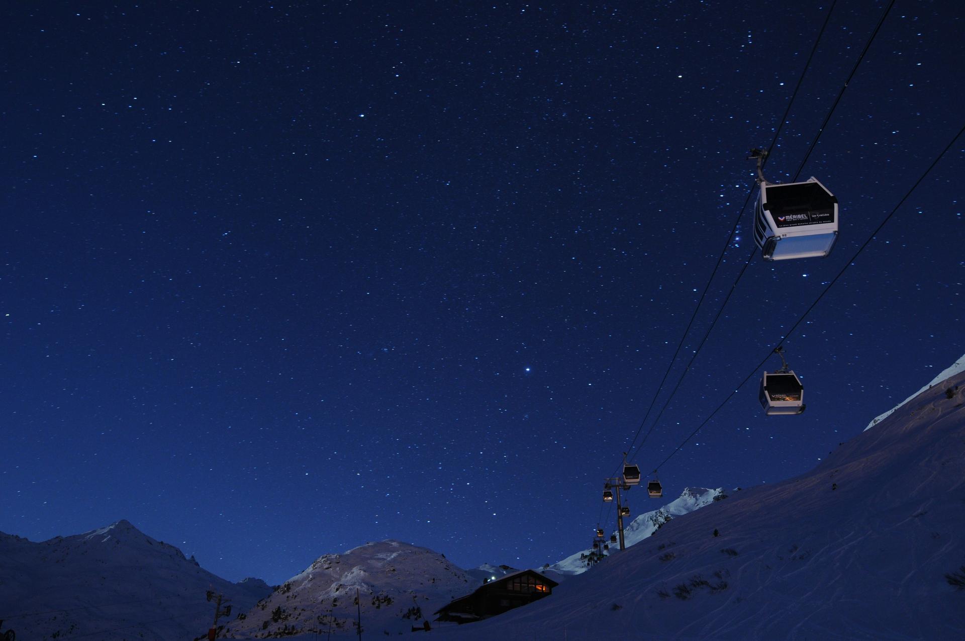 slopes-at-night-cable-car-starry-sky-alps
